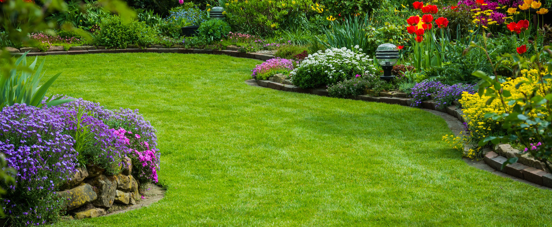 The Top Six Reasons to Mulch Your Lawn - Radmore & Tucker